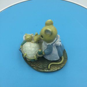 Mom putting kids to bed - cute mice figurine